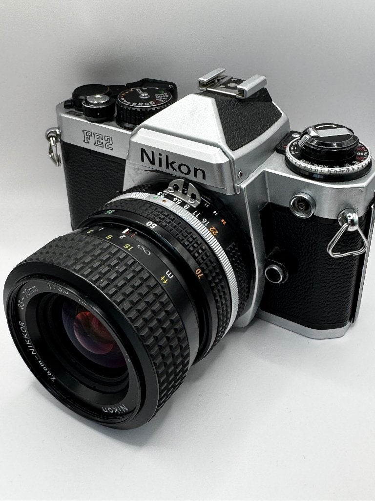 Nikon FE2 + Zoom Nikkor 35–70mm f/3.3–4.5, Ophalen of Verzenden, Gebruikt, Spiegelreflex, Nikon