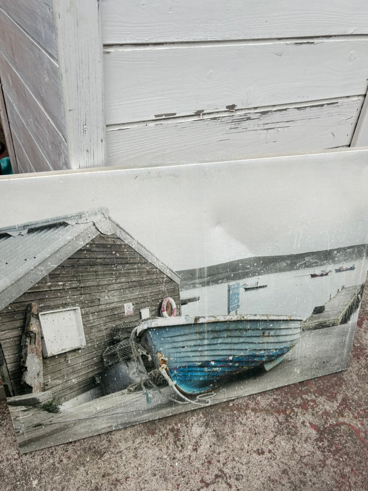 Tableau avec bateau et cabane