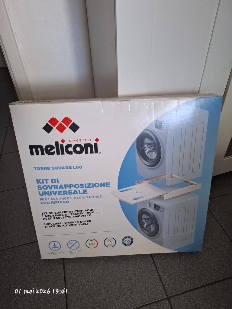 Tussenlade wasmachine/droogkast, Ophalen
