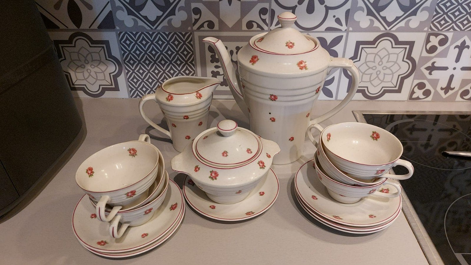 Koffieset met roosje, Ophalen