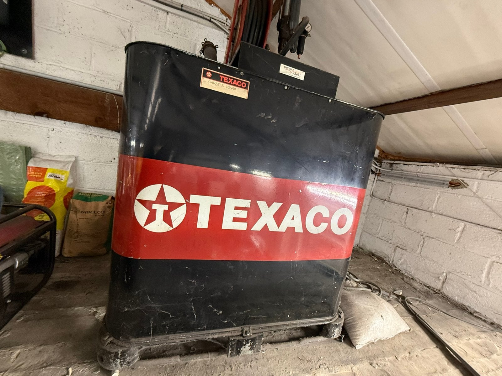 Outentieke olietank van Texaco, Doe-het-zelf en Bouw, Ophalen, Zo goed als nieuw