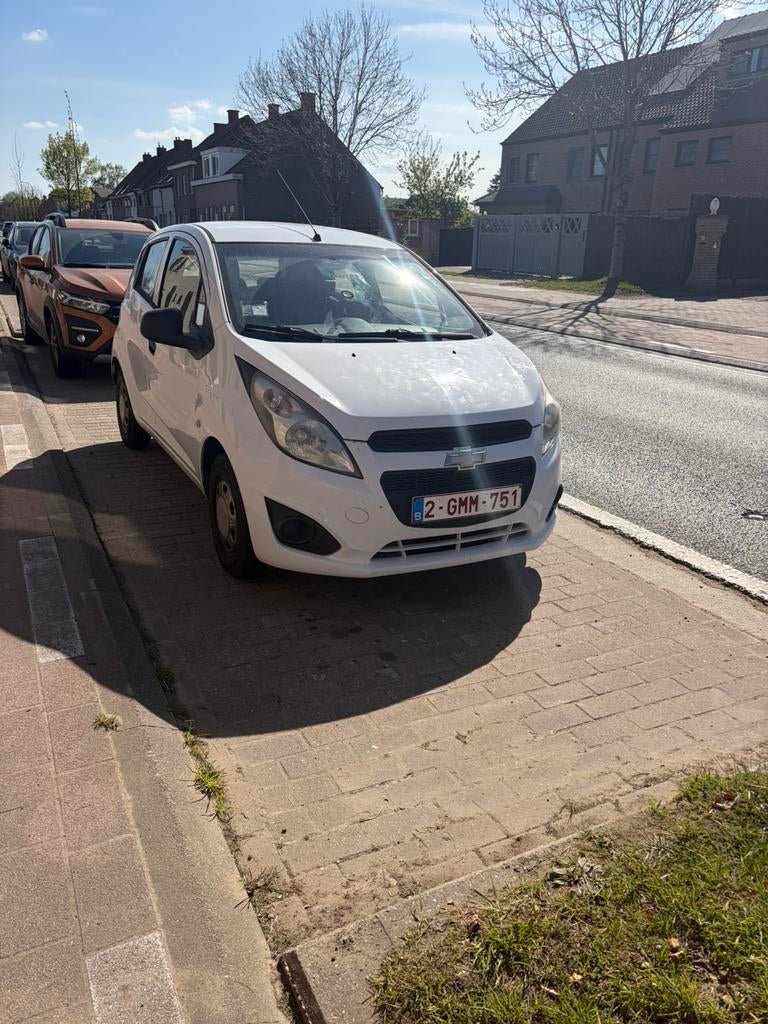 Chevrolet spark 2013 met 113000 km met carpas toppertje, Postzegels en Munten, Aandelen en Waardepapieren, Ophalen