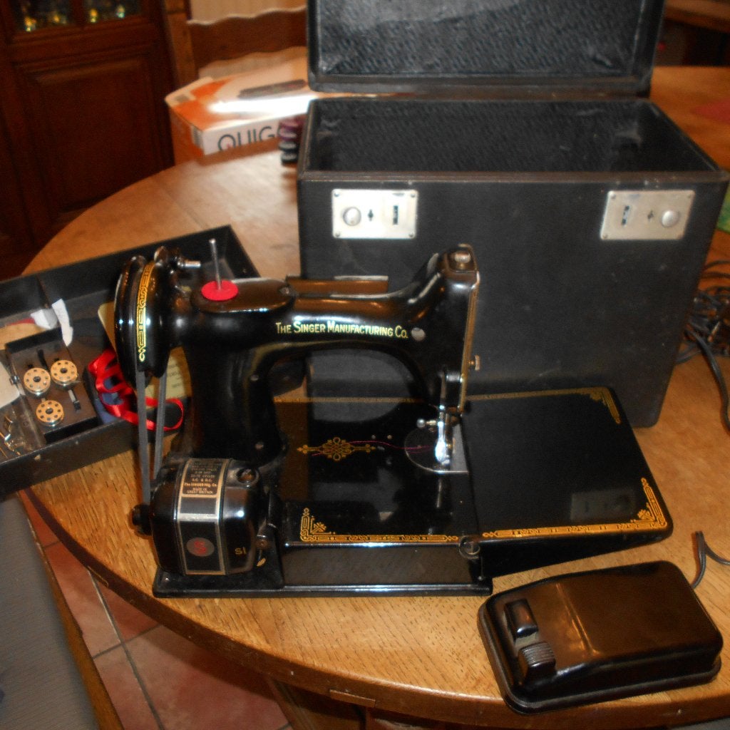 machine a coudre ancienne, Ophalen