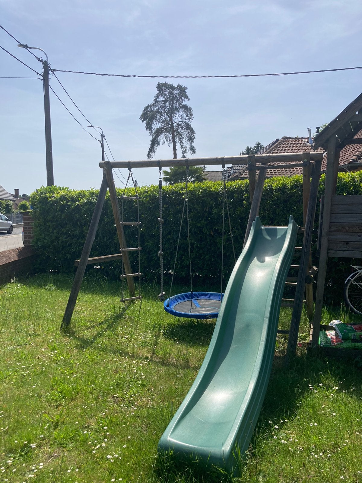 Schommel met glijbaan, Gebruikt, Schommel