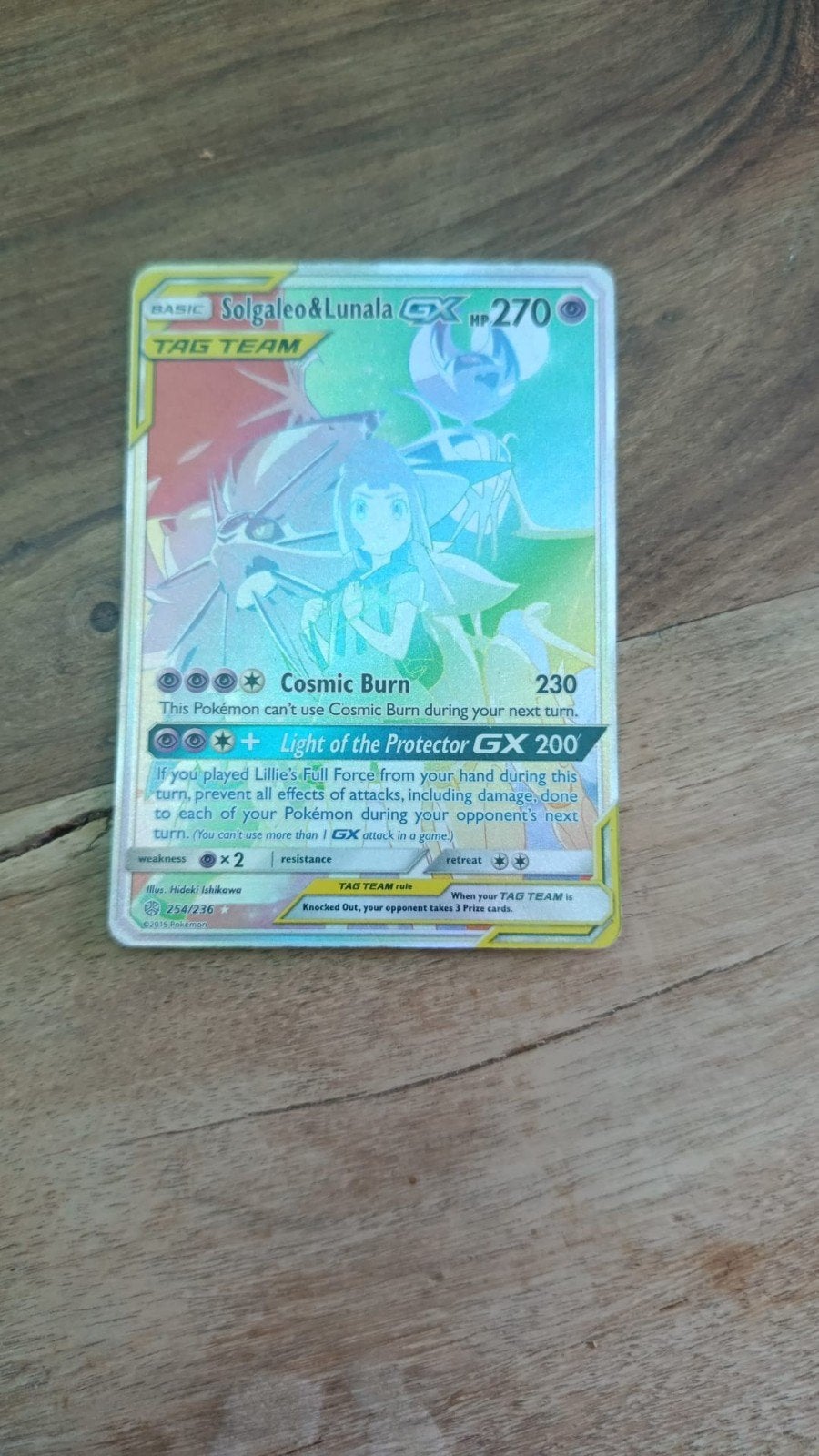 pokemon kaart solgaleo&lunala GX rainbow., Hobby en Vrije tijd, Ophalen of Verzenden, Zo goed als nieuw, Losse kaart, Foil