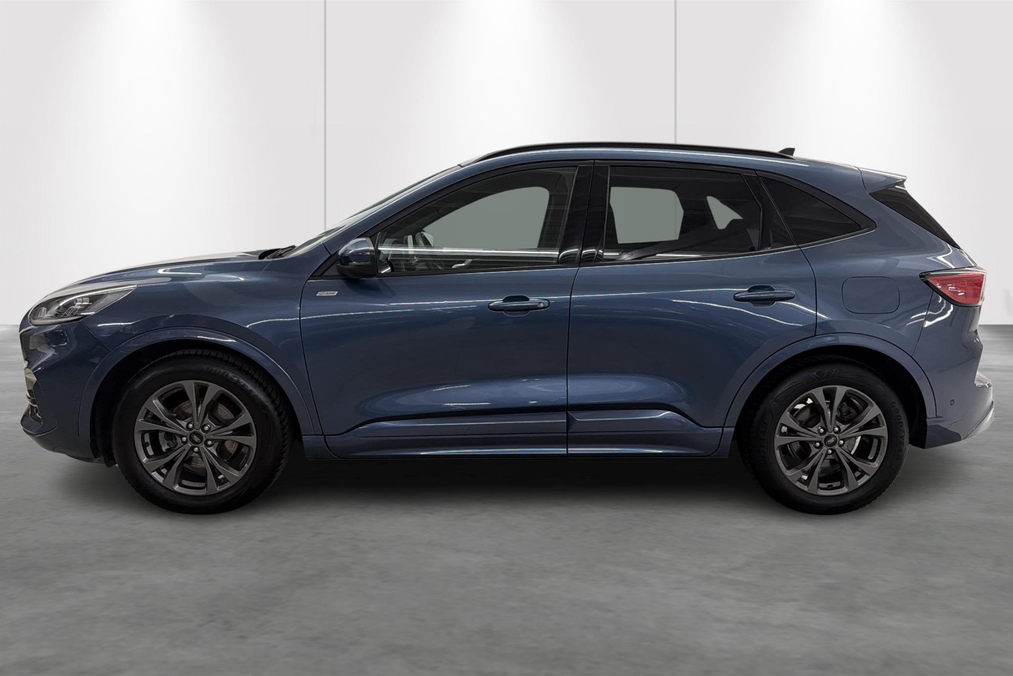 Ford Kuga 2.5i FHEV Aut. 140kW ST-Line, Stof, Gebruikt, 4 cilinders, Blauw