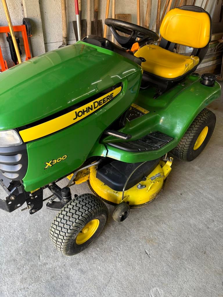 John deere x300 zitmaaier, Ophalen