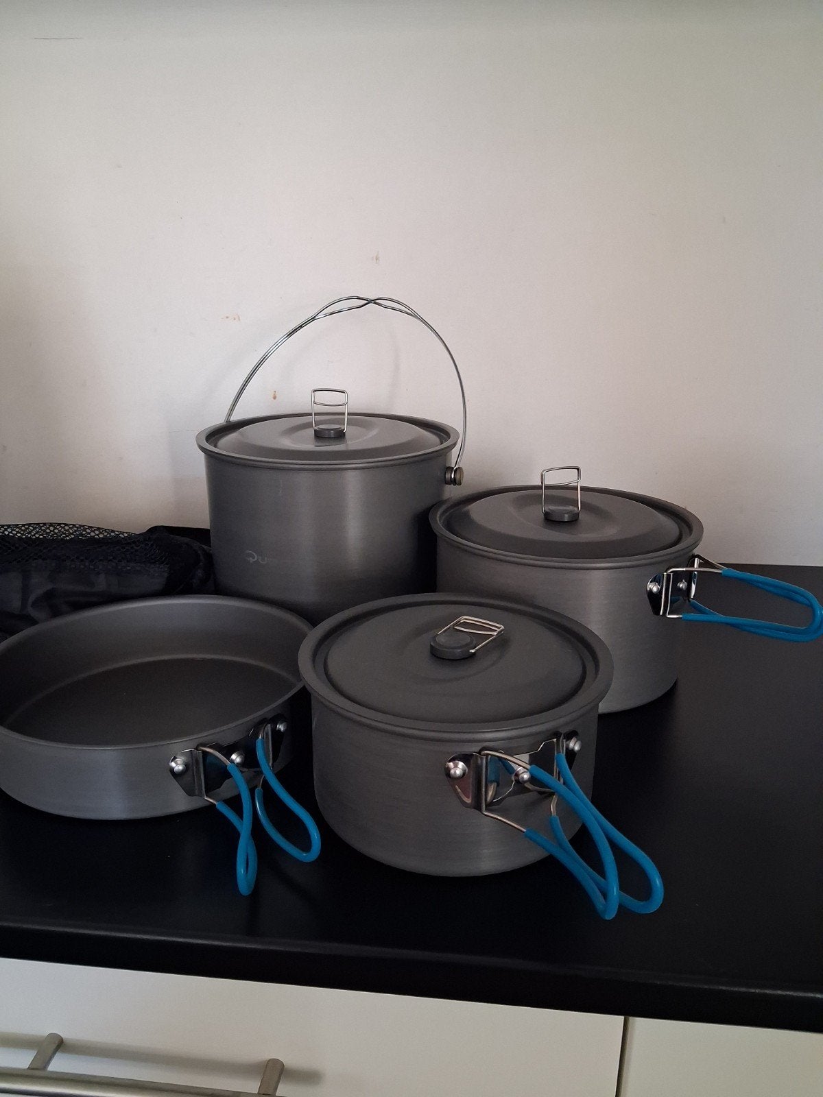 set kookpotten voor kamperen, Ophalen