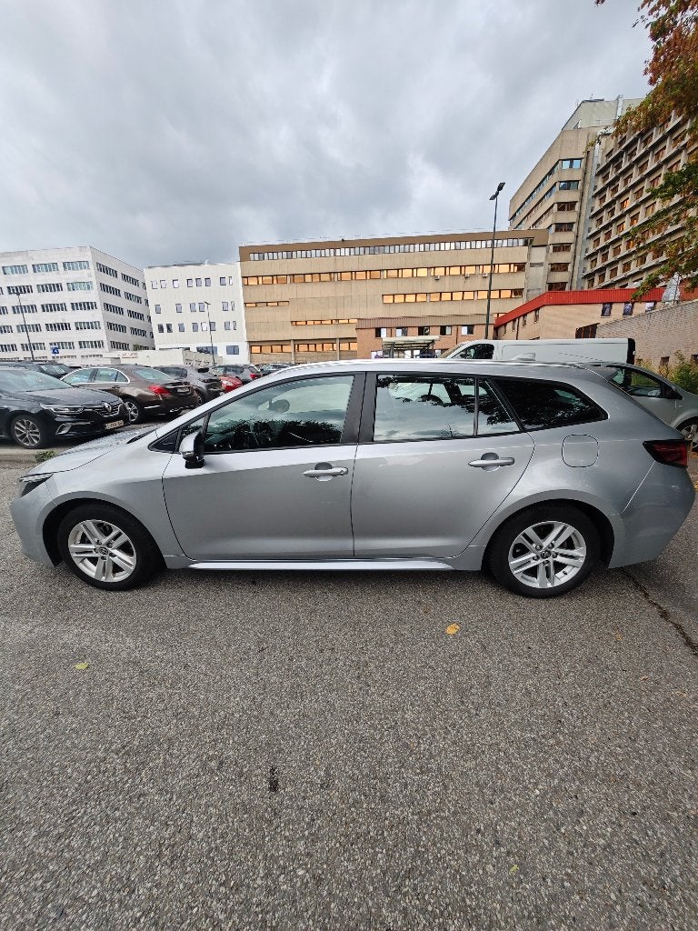 Corolla Hybrid Touring Sports 80.000 km, Auto's, Dealer onderhouden, Euro 6, Overige bekleding, Corolla
