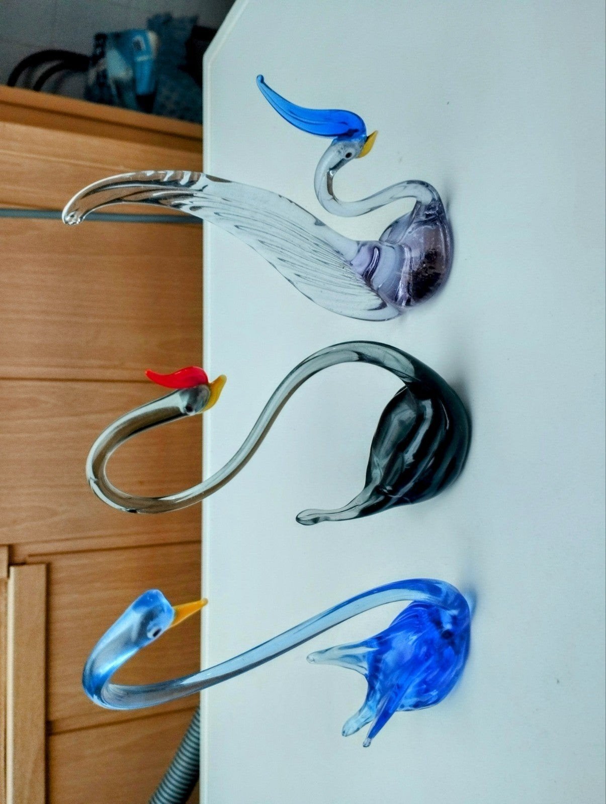 3 kleine zwanen kleur licht blauw, Ophalen