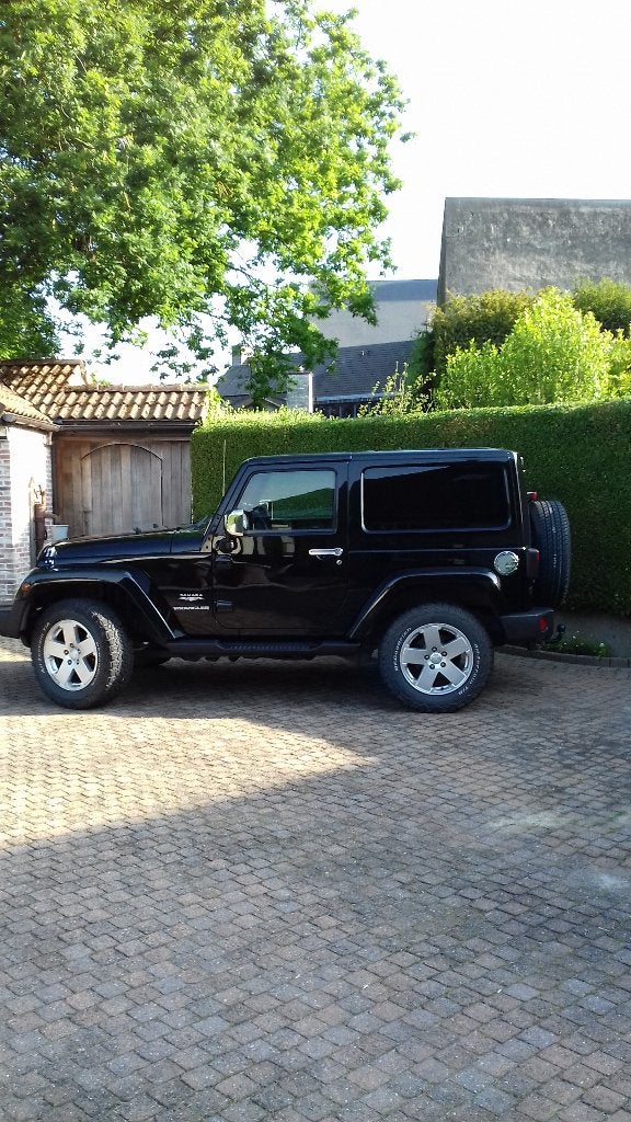 Jeep Wrangler 2.8 CRD Sahara., Auto's, Automaat, Zwart, Zwart, Leder