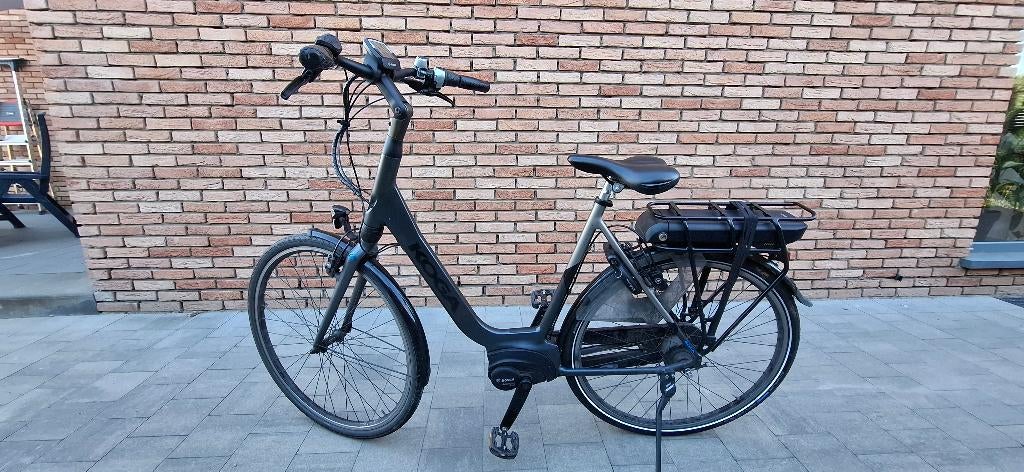 Koga elektrische damesfiets, Fietsen en Brommers, Gebruikt, Velgrem, Versnellingen, 56 cm of meer
