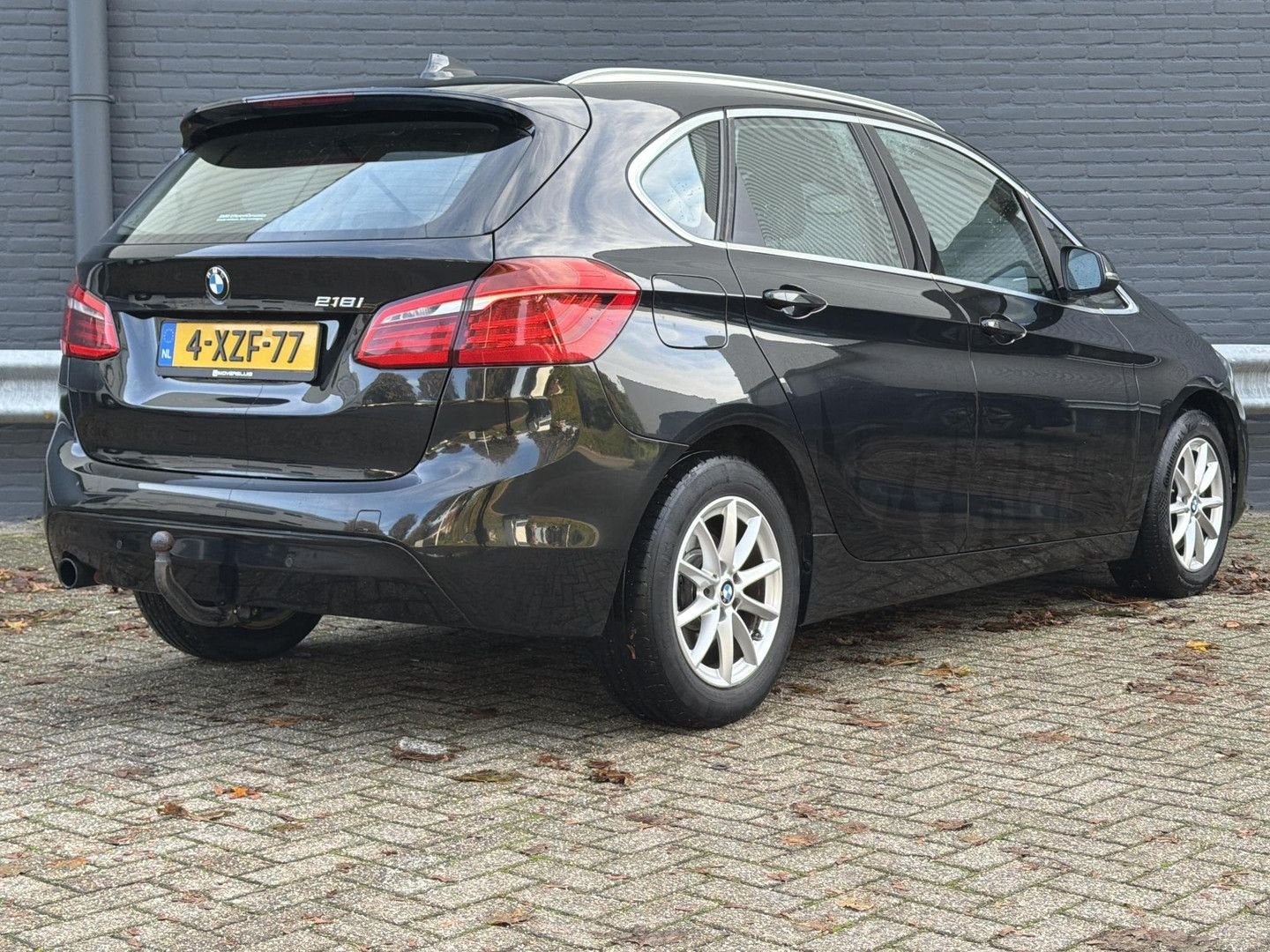 BMW 218 Active Tourer 2-serie 218i High Executive | Leder |, Autos, Achat, Entreprise, Boîte manuelle, Noir