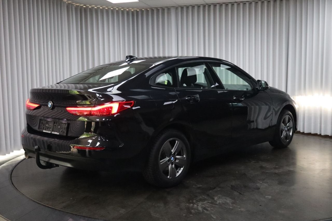 BMW 2 Serie 218 Gran Tourer 218iA Gran Coupé (bj 2023), Auto's, Stof, 136 pk, Zwart, Bedrijf