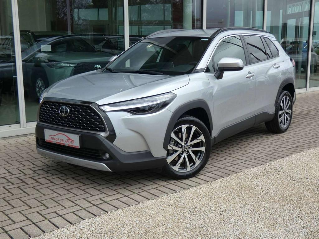 Toyota Corolla Cross 1.8 Hybrid 140pk STYLE +Dodehoek +Reser, Auto's, Toyota, Stof, Gebruikt, Zwart, 4 cilinders