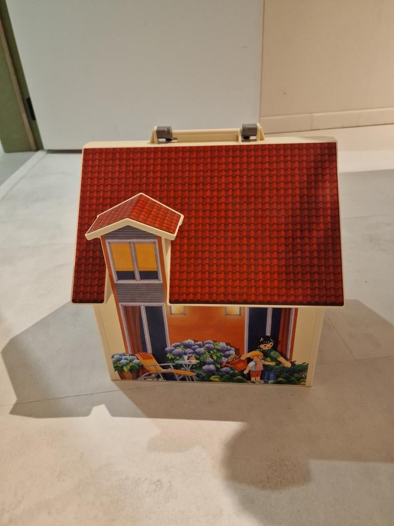 Draagbaar playmobilhuis, Ophalen