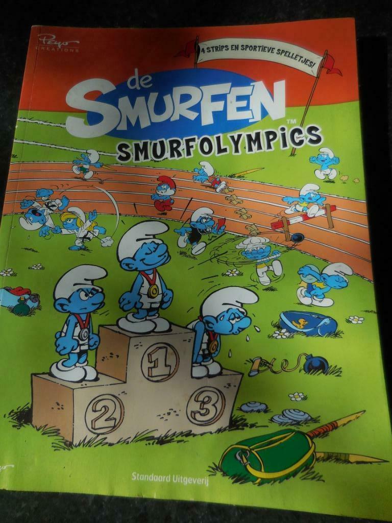 [2666] strip de smurfen met 4 strips en sportieve spelletjes, Boeken, Eén stripboek, Ophalen of Verzenden, Zo goed als nieuw