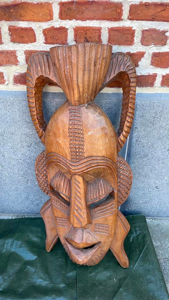 Afrikaans masker, Ophalen