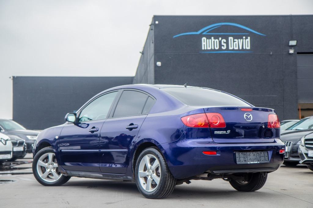 Mazda 3 Sedan 1.6i 16V Benzine / EXPORT / AIRCO / ISOFIX, Auto's, Mazda, Voorwielaandrijving, 4 deurs, Stof, Zwart