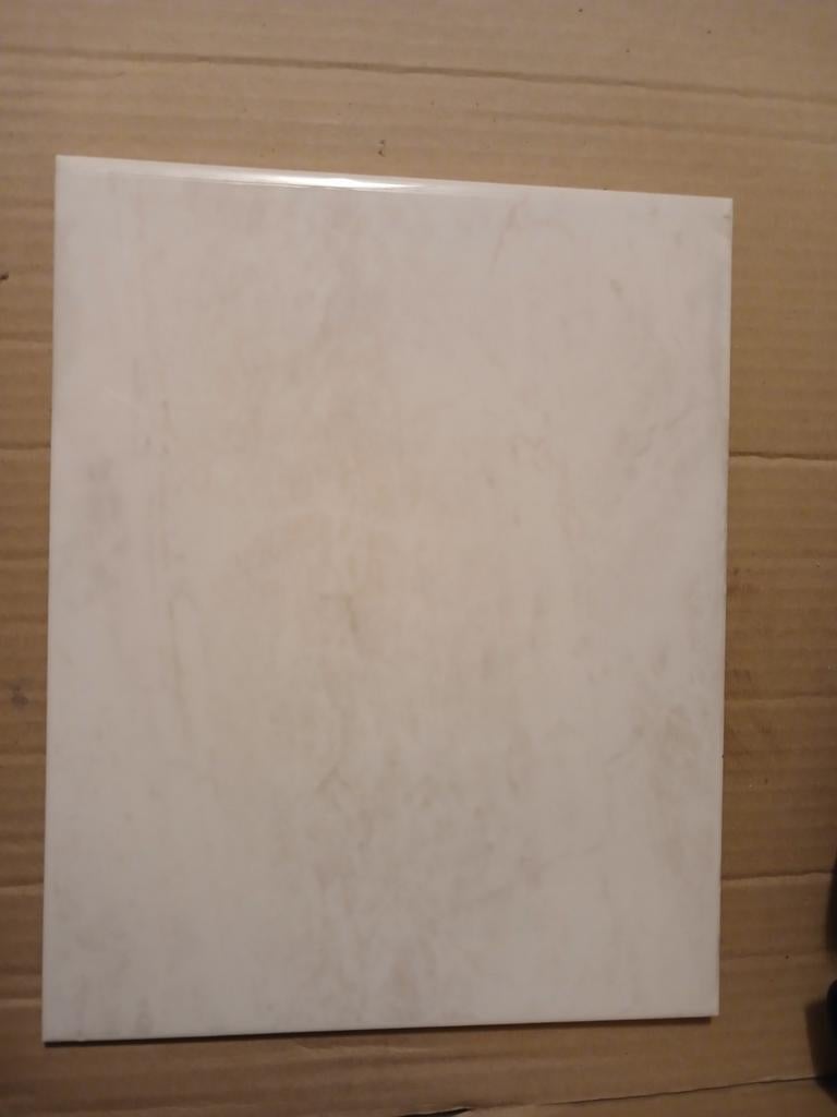 Carrelage de faïence blanc marbré, Enlèvement