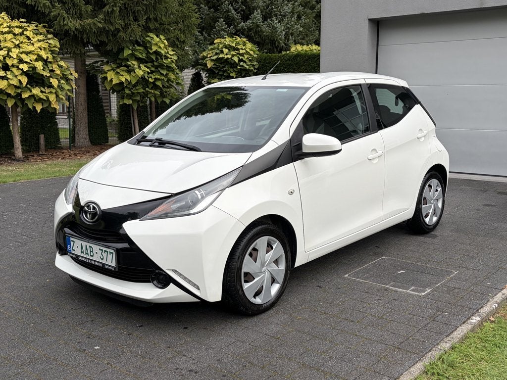 Toyota Aygo 1,0 benzine - Airco - Camera - 1 jaar garantie, Auto's, Voorwielaandrijving, Stof, Wit, Bedrijf