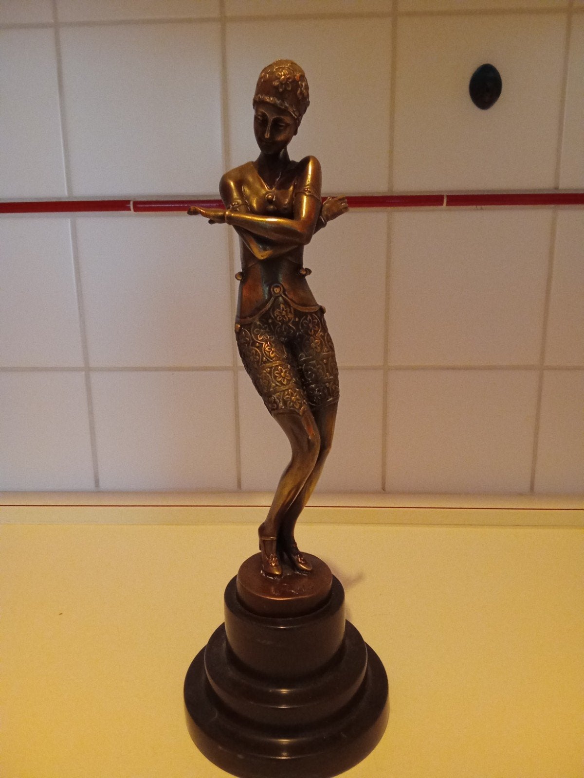 bronzen beeld, Ophalen