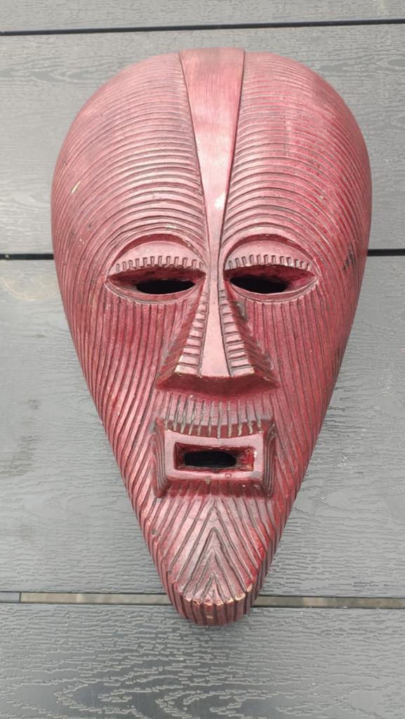 Afrikaans masker, Ophalen