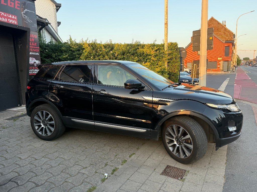 Land Rover Evoque Benzine 2.0 Si4 4WD Automaat Prestige, Zwart, Leder, Bedrijf, SUV of Terreinwagen