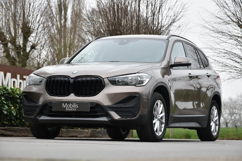 BMW X1 sDrive18i Benzine Facelift NaviPro/Navigatie/Garantie, Auto's, BMW, Bruin, Bedrijf, SUV of Terreinwagen, BTW verrekenbaar