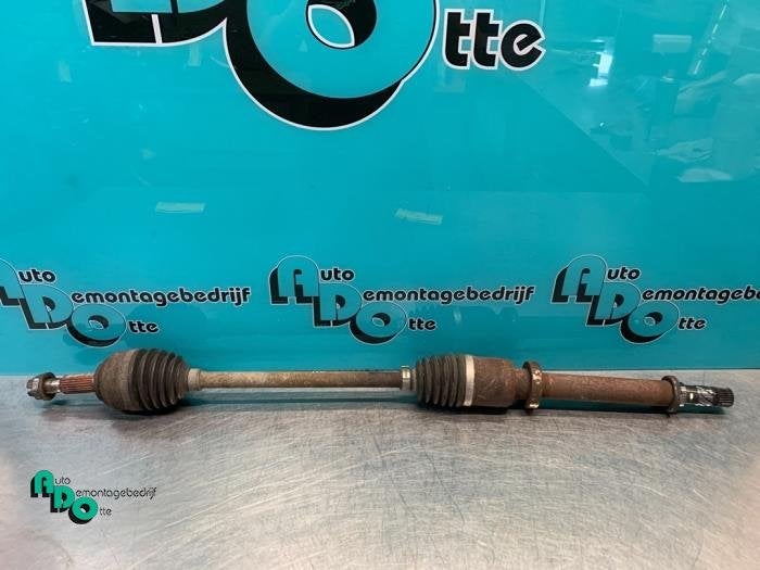 Arbre de transmission avant droit d'un Renault Clio (Clio 3, Renault, -, 3 mois de garantie, Utilisé