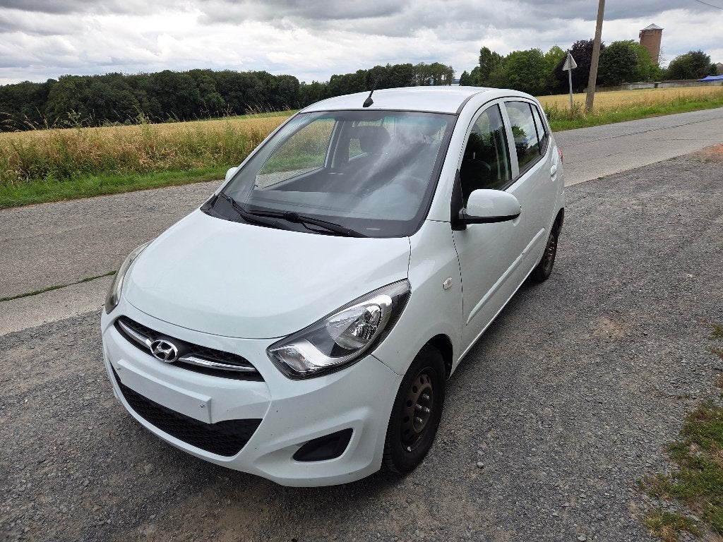 Hyundai i10 2014 94429 km garantie 1 an, Auto's, Hyundai, Voorwielaandrijving, Stof, Zwart, 4 cilinders