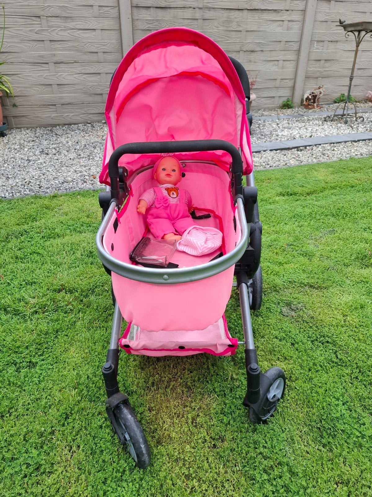 Speelgoed kinderwagen, Ophalen