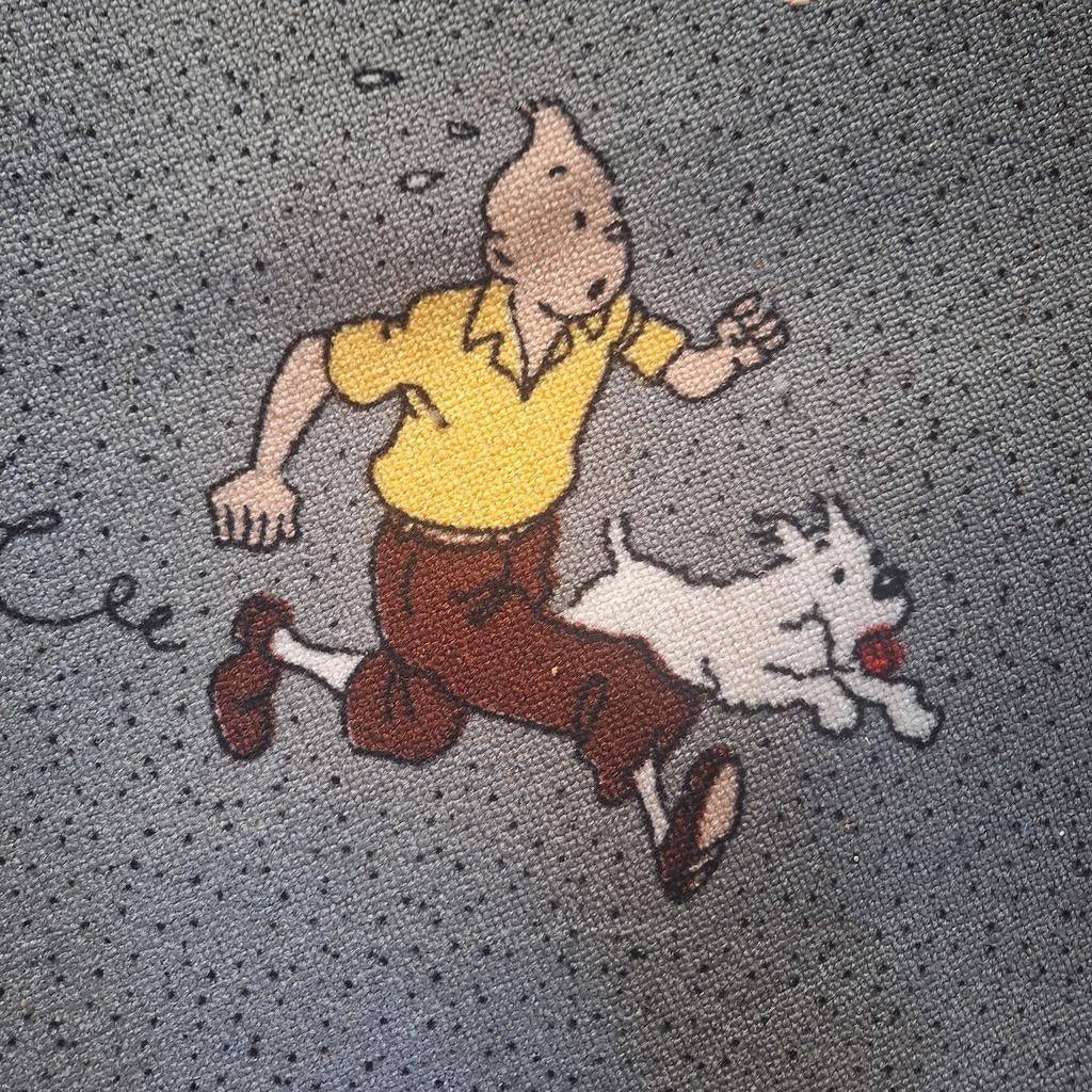 Le nouveau tapis Tintin original est toujours dans l'emballa, Enlèvement