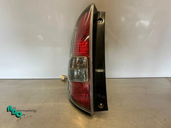 Feu arrière gauche d'un Daihatsu Sirion (Sirion 2 05-), Daihatsu, -, 3 mois de garantie, Utilisé