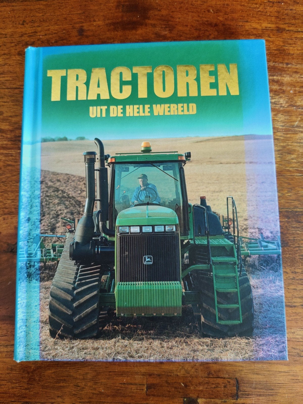 Tractoren uit de hele wereld., Boeken, Ophalen of Verzenden, Gelezen