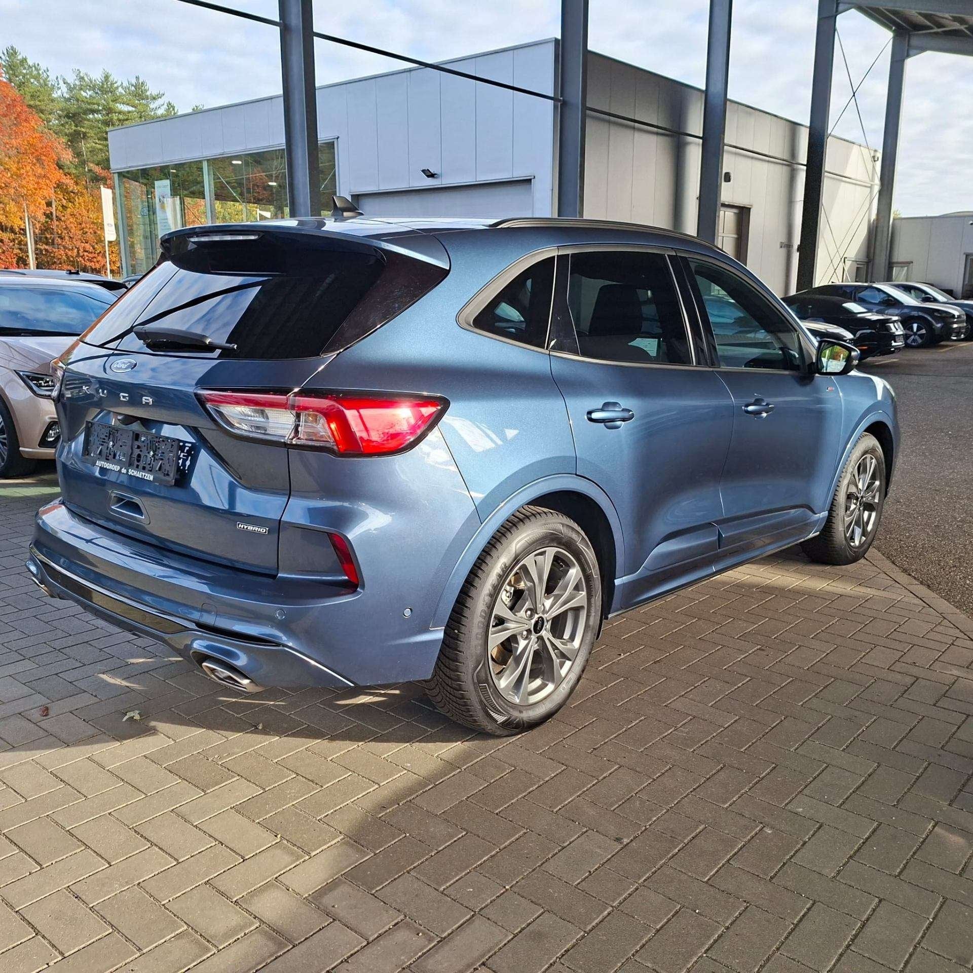 Ford Kuga St - Line 2.5i FHEv / winterpack / Elek trekhaak, Auto's, Automaat, Stof, Gebruikt, Blauw