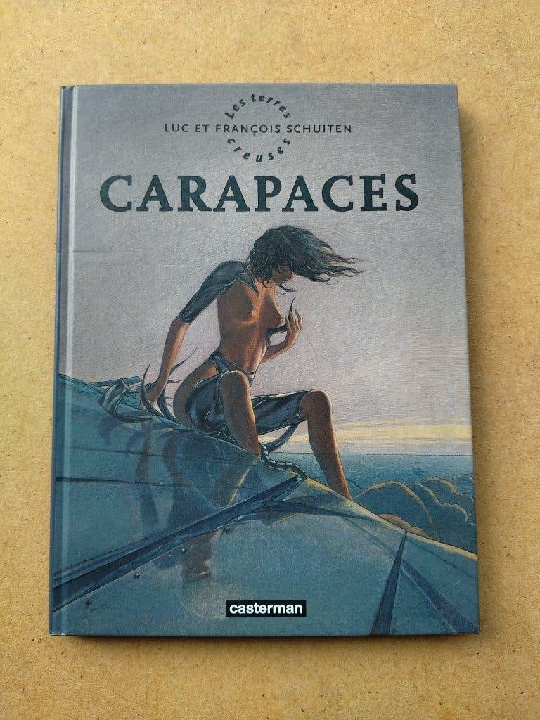 Les terres creuses - Carapaces / EO 2010, Enlèvement ou Envoi, Une BD, Comme neuf, Luc et François Schuiten