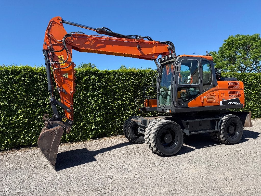 bandenkraan DOOSAN, Enlèvement, Excavatrice