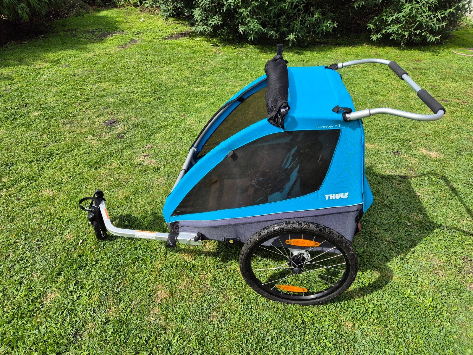 Fietskar Thule Coaster XT + Infant Sling, Ophalen