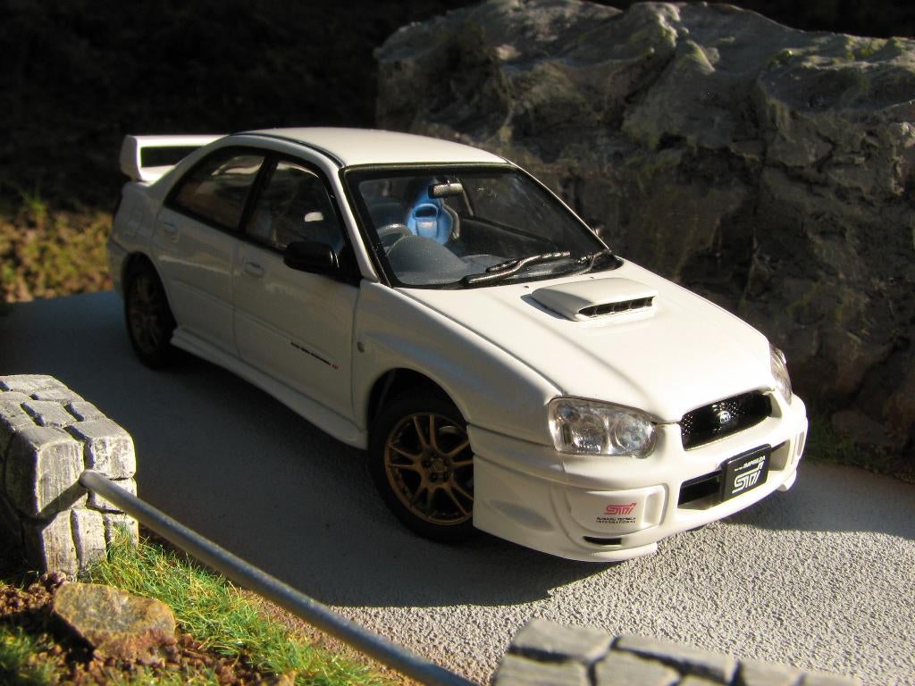 Subaru Impreza WRX STi 2003 wit - AutoArt 1:43, Ophalen of Verzenden, Zo goed als nieuw, Auto, Overige merken