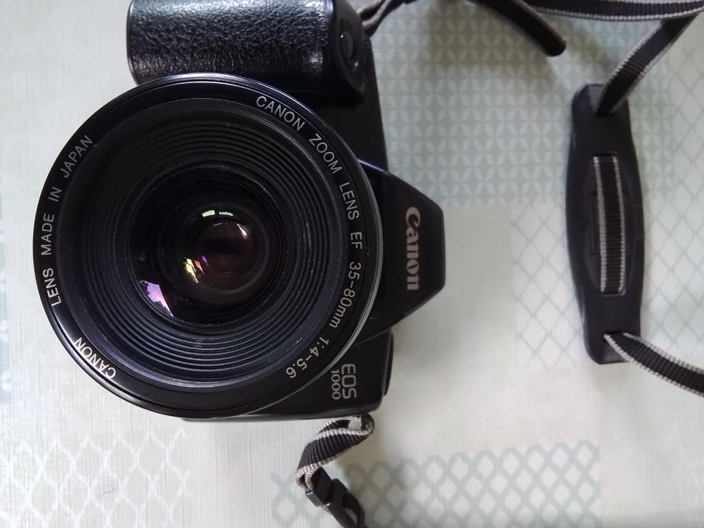 Analoog fototoestel Canon 1000 en toebehoren., Ophalen of Verzenden, 1980 tot heden, Fototoestel