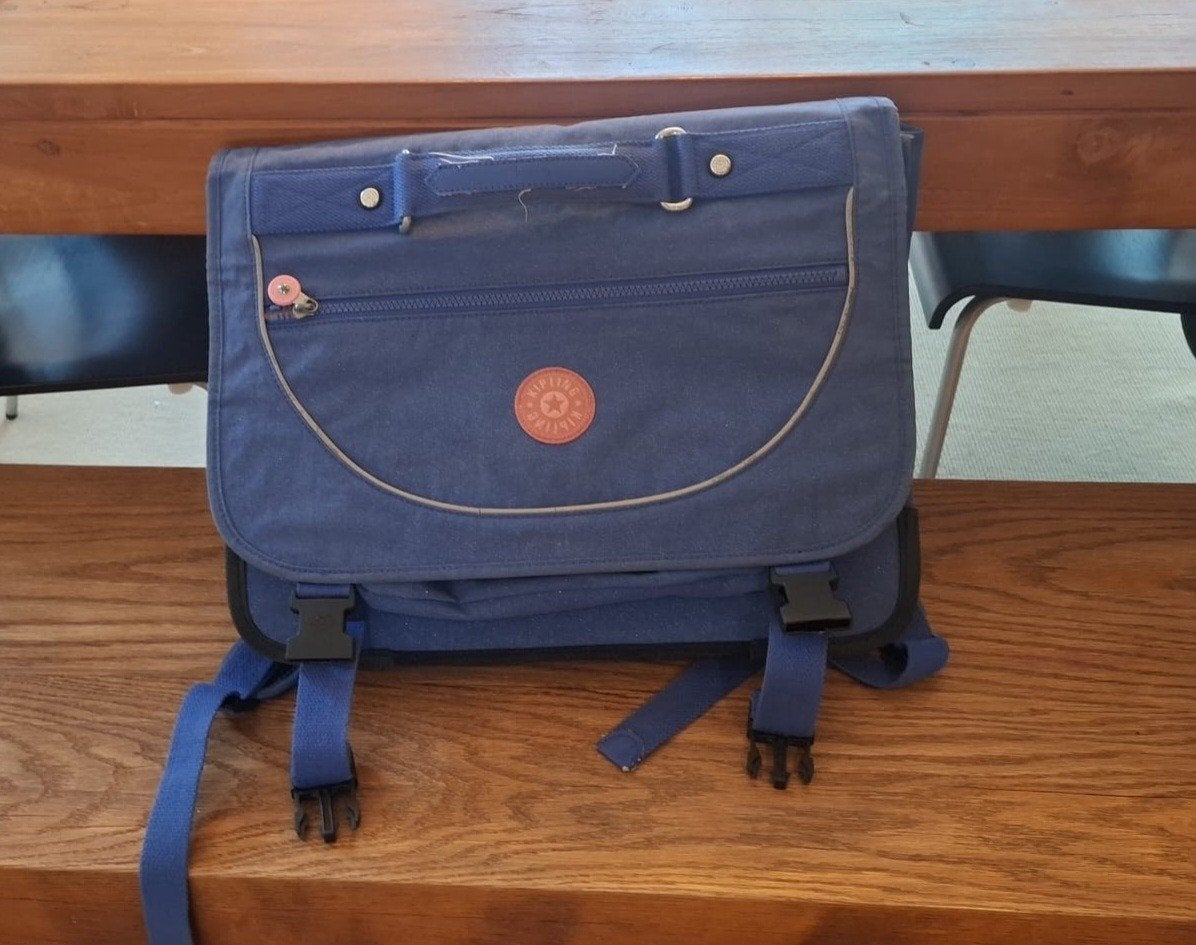boekentas Kipling, Ophalen