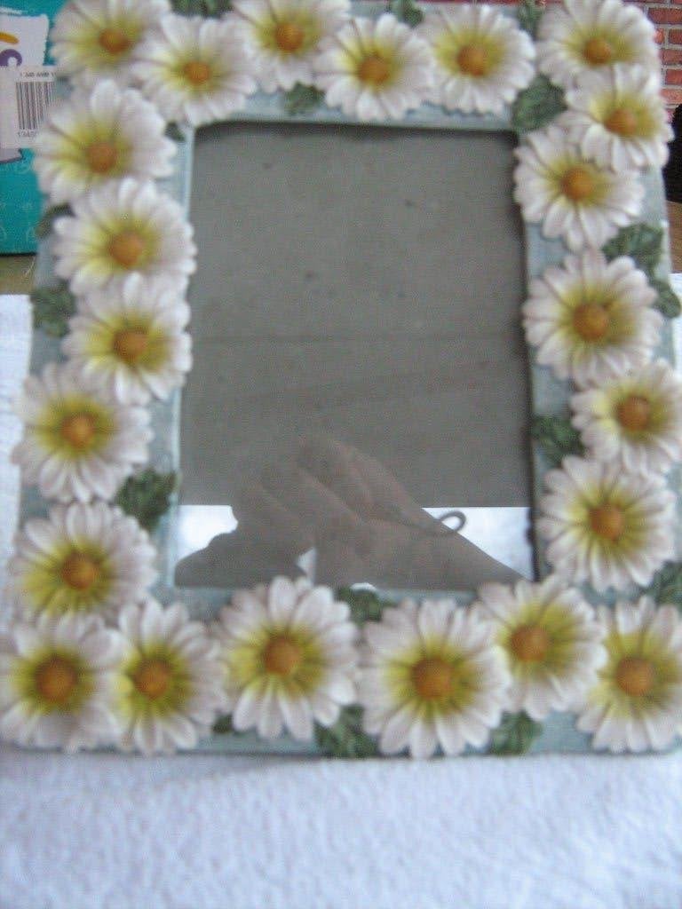 kadertje met bloemen, Ophalen