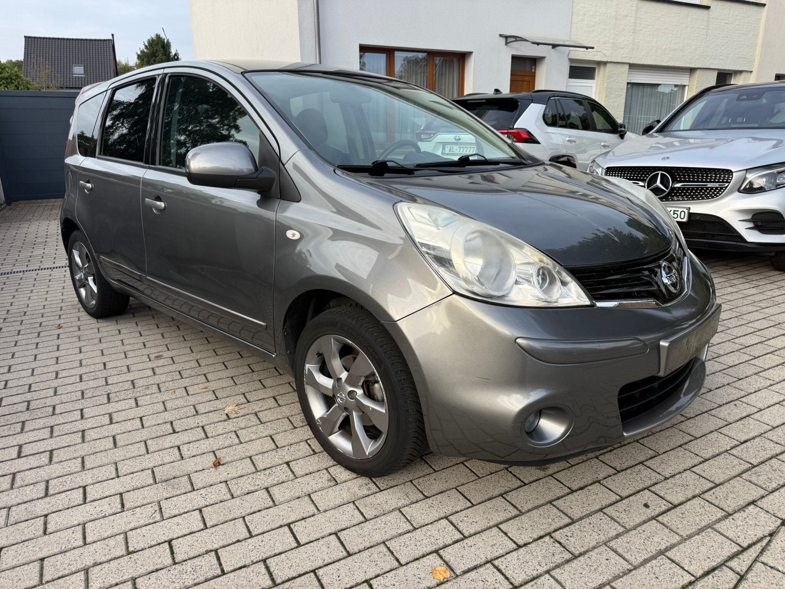 Nissan Note bj2011 1 eig 1.4 Benzine 110451km, Auto's, Voorwielaandrijving, Stof, 139 g/km, 4 cilinders
