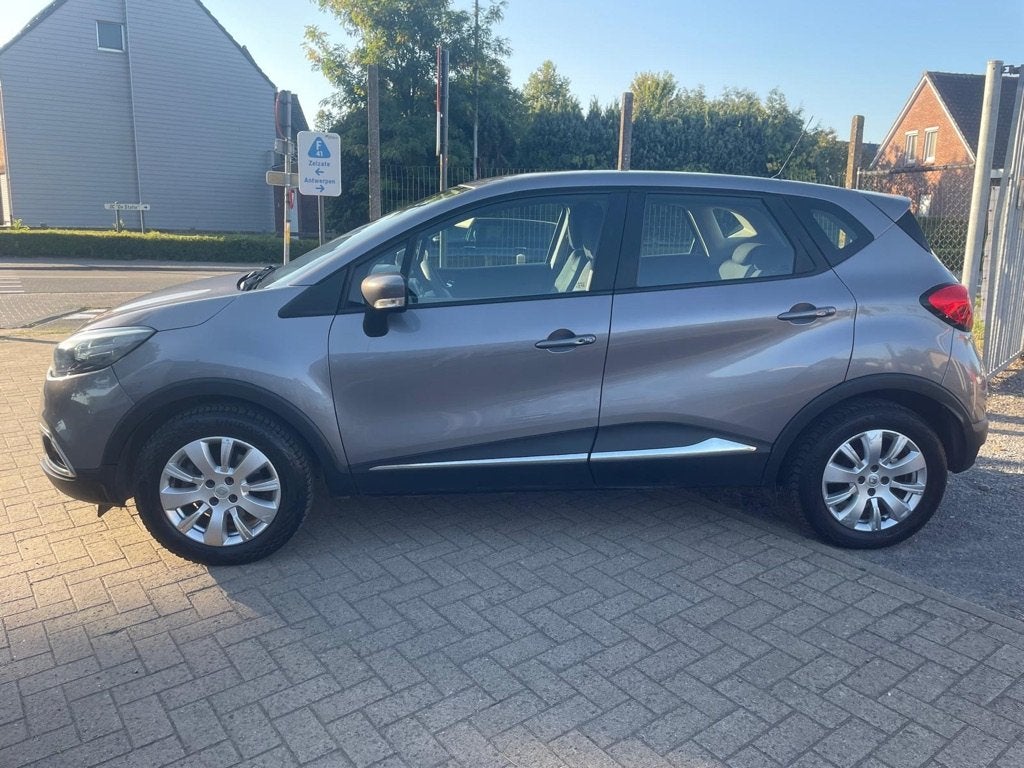 Renault Captur 1.5DCi van 08/2013 met 130000km!, Auto's, Voorwielaandrijving, Stof, Zwart, 4 cilinders