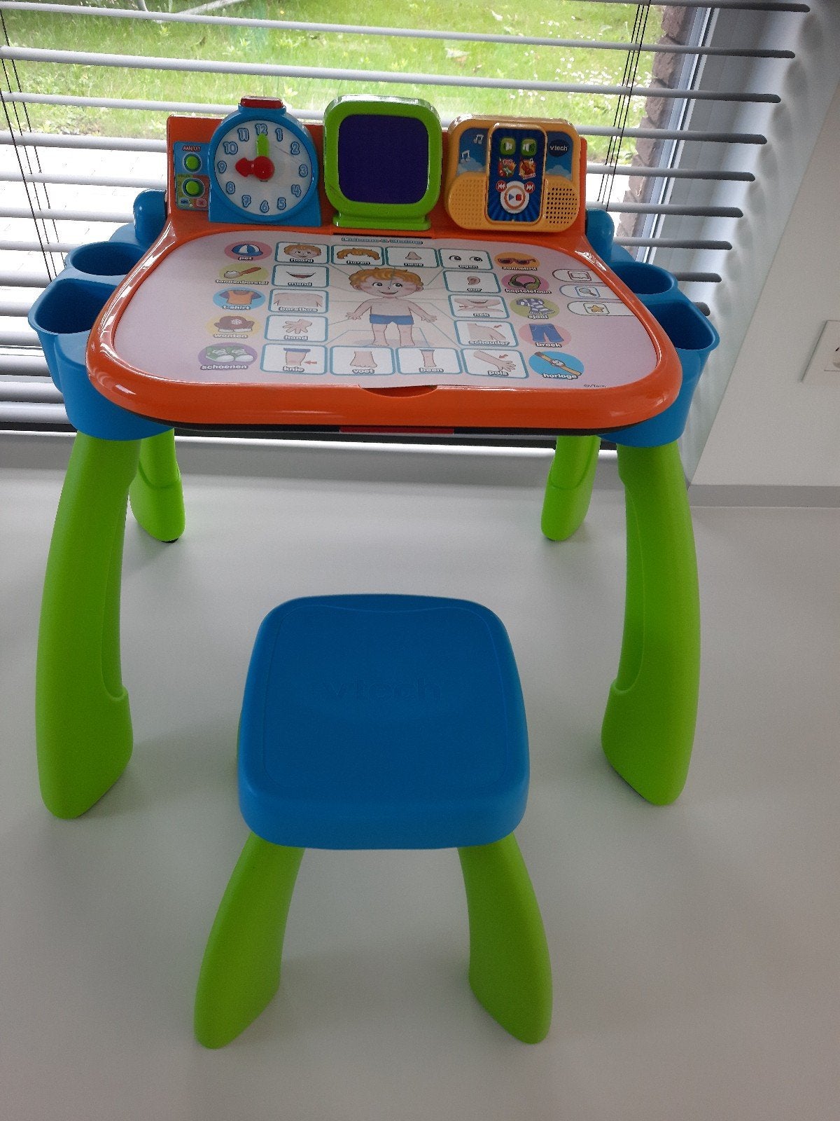 Vtech activiteitentafel, Ophalen