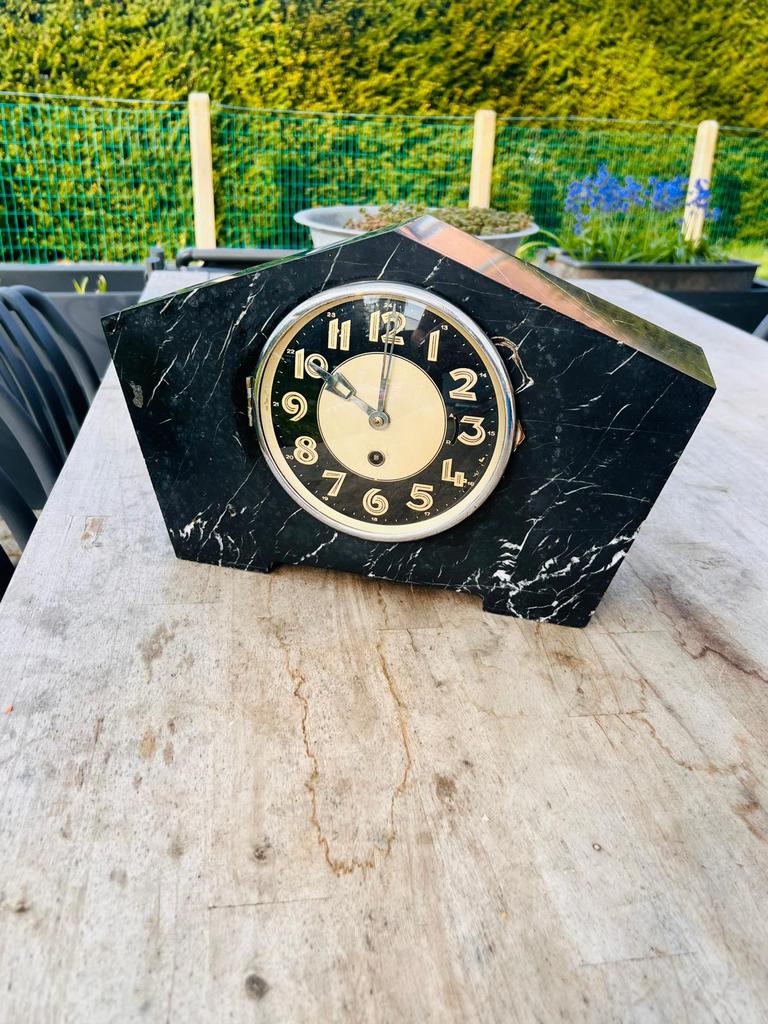 Art deco haardklok uit de jaren 30, Ophalen