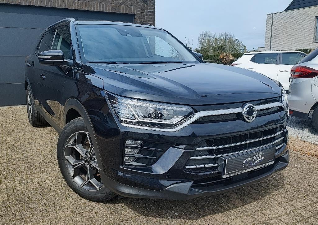 SSANGYONG Korando 1.6Xdi Sapphire automatic +2JAAR GARANTIE, Auto's, 4 cilinders, 2000 kg, Zwart, Leder