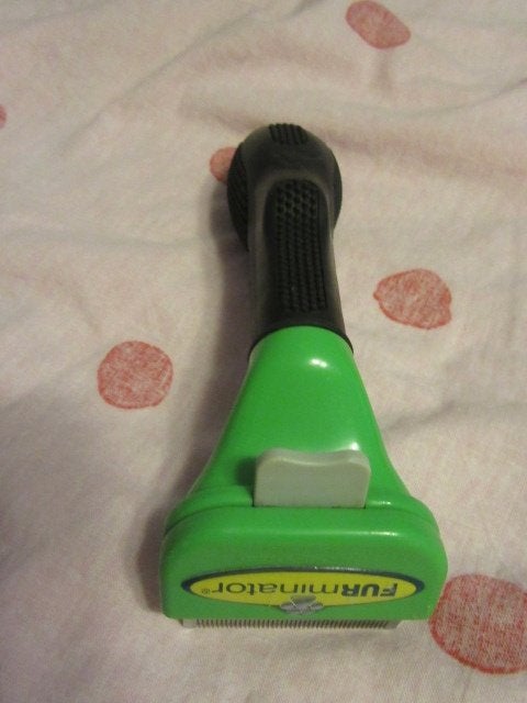 Groene furminator - kam, Ophalen of Verzenden, Zo goed als nieuw