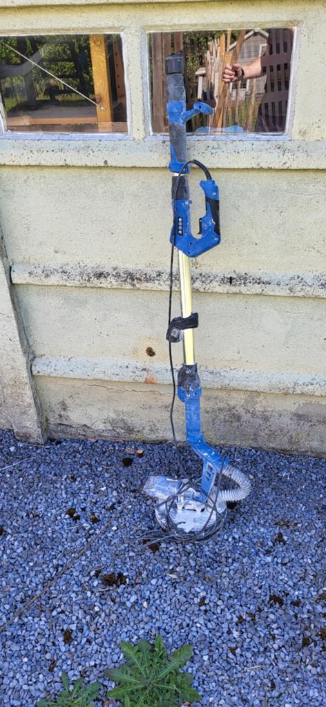 Gyproc schuurmachine . Plafondschuurmachine, Ophalen